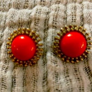 Vintage earrings! Vibrant orange stone with two rings of gold dots.